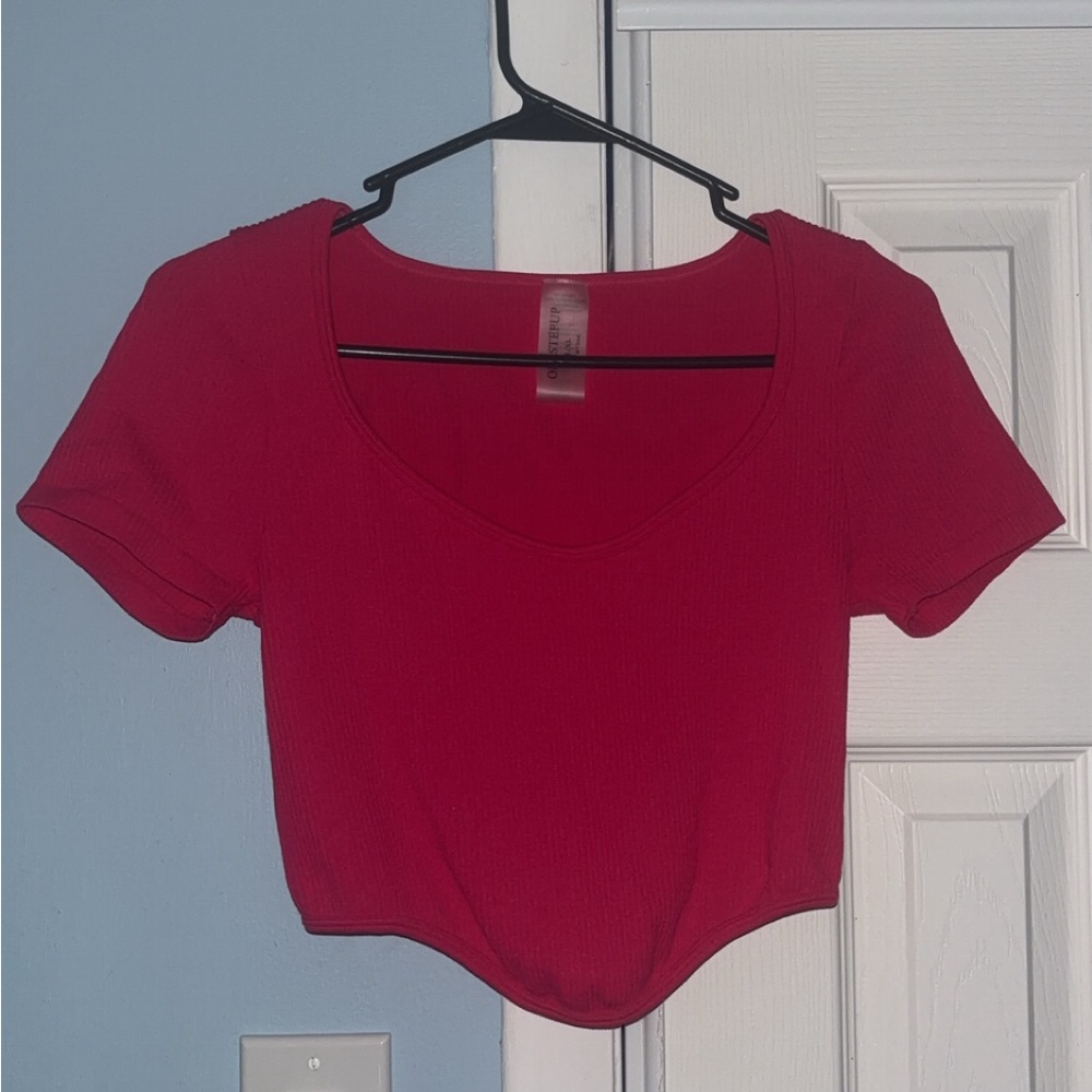 pink cropped shirt